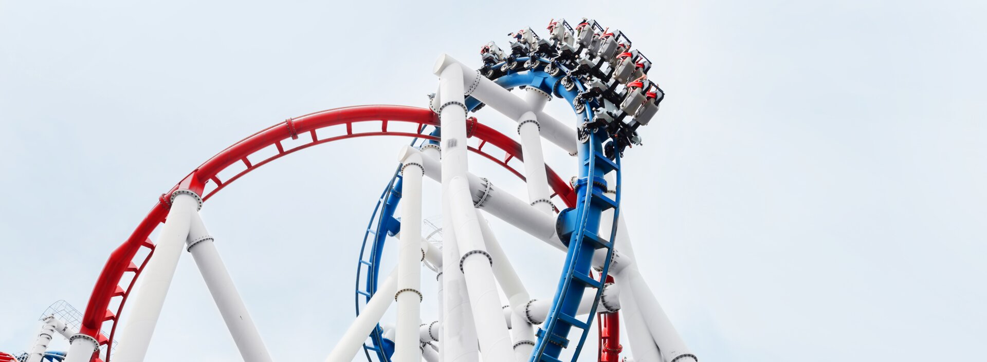 © AdobeStock_95605949_siraphol (Roller coaster rail ride in the park)